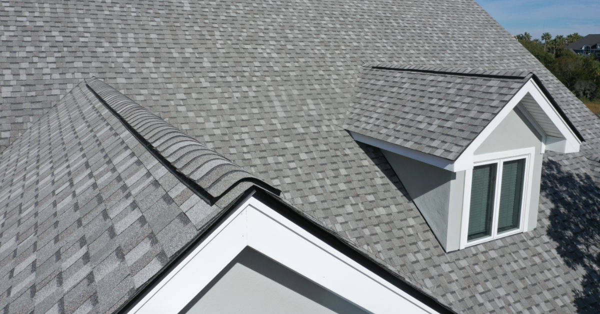 Make roofing last with quality material. Home with good shingles on roof.